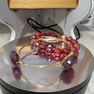Bourbon and boweties Gold Wire Bangle with Red Faceted Gem Accents